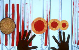 In the foreground, is the dark silhouette of a pair of hands outstretched at the bottom of the painting. Floating above the fingertips are four circular figures with concentric designs suggesting flowers. In the background, red and blue vertical lines and stripes could represent garden rows.